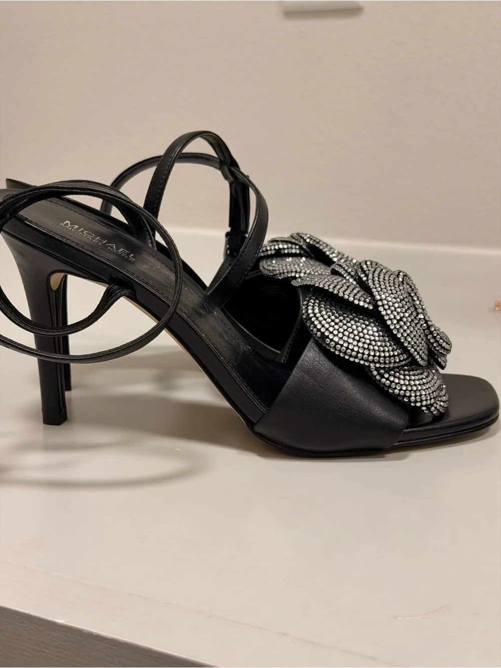 MICHAEL Michael Kors Black Heeled Sandals with Crystal Rosette